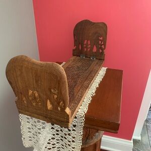 Beautiful India detailed bookshelf. Extends and is solid wood.